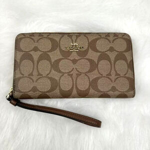 Coach Large Phone Wallet In Signature Canvas In Khaki Saddle F73418 NWT